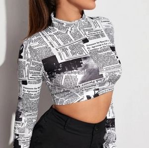 newspaper long sleeve crop top